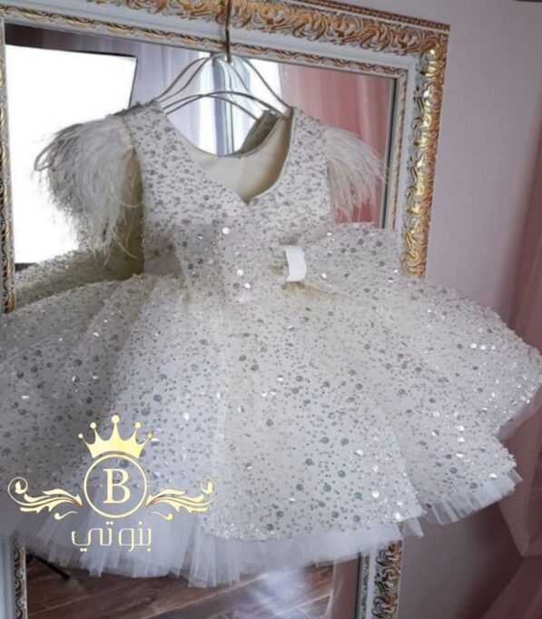 ⁦white handmade dress with feather⁩ - الصورة ⁦3⁩